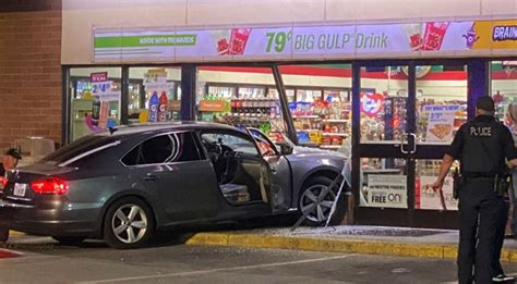 SUV crashes into 7-Eleven store in Aurora where fatally shot man is found by vehicle